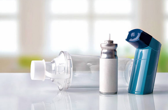 Asthma inhalers and a breathing tools. 