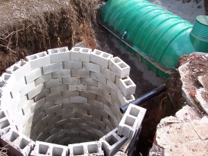 Photo showing a septic tank and a seepage pit.