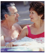 elderly couple in hot tub