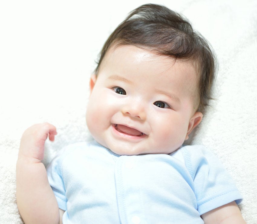 Image of a smiling toddler