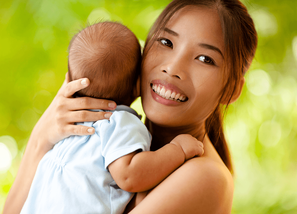 Pic of a smiling mom and baby